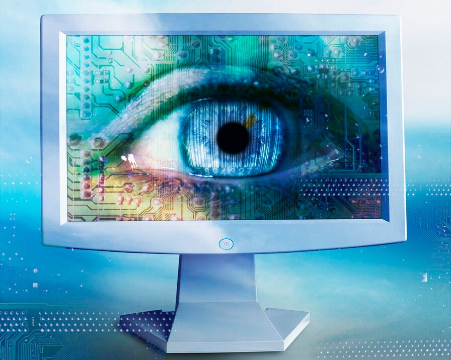 An eye symbol on a computer desktop representing computer vision.